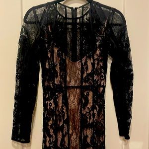 The Jetset Diaries long sleeve black dress with nude underlining size XS